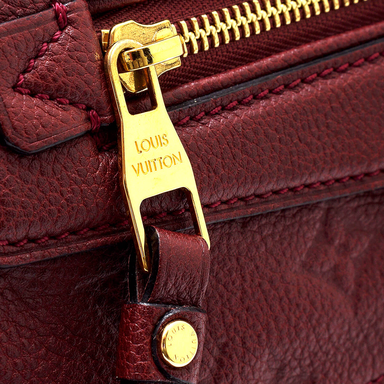 Louis Vuitton - Burgundy Monogram Empreinte Leather Petillante Clutch